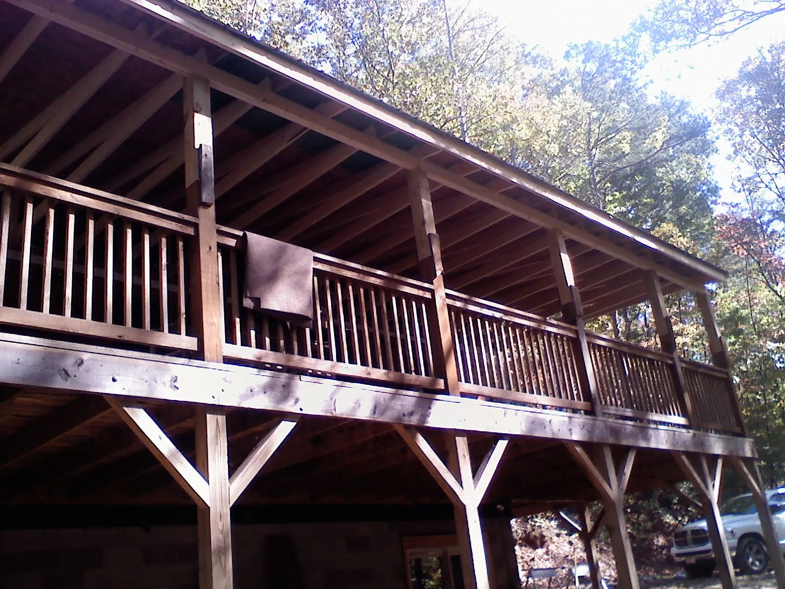 Timber framing under a new elevated porch and deck — Roof Leak Repair in East Hanover by Roofing Brothers